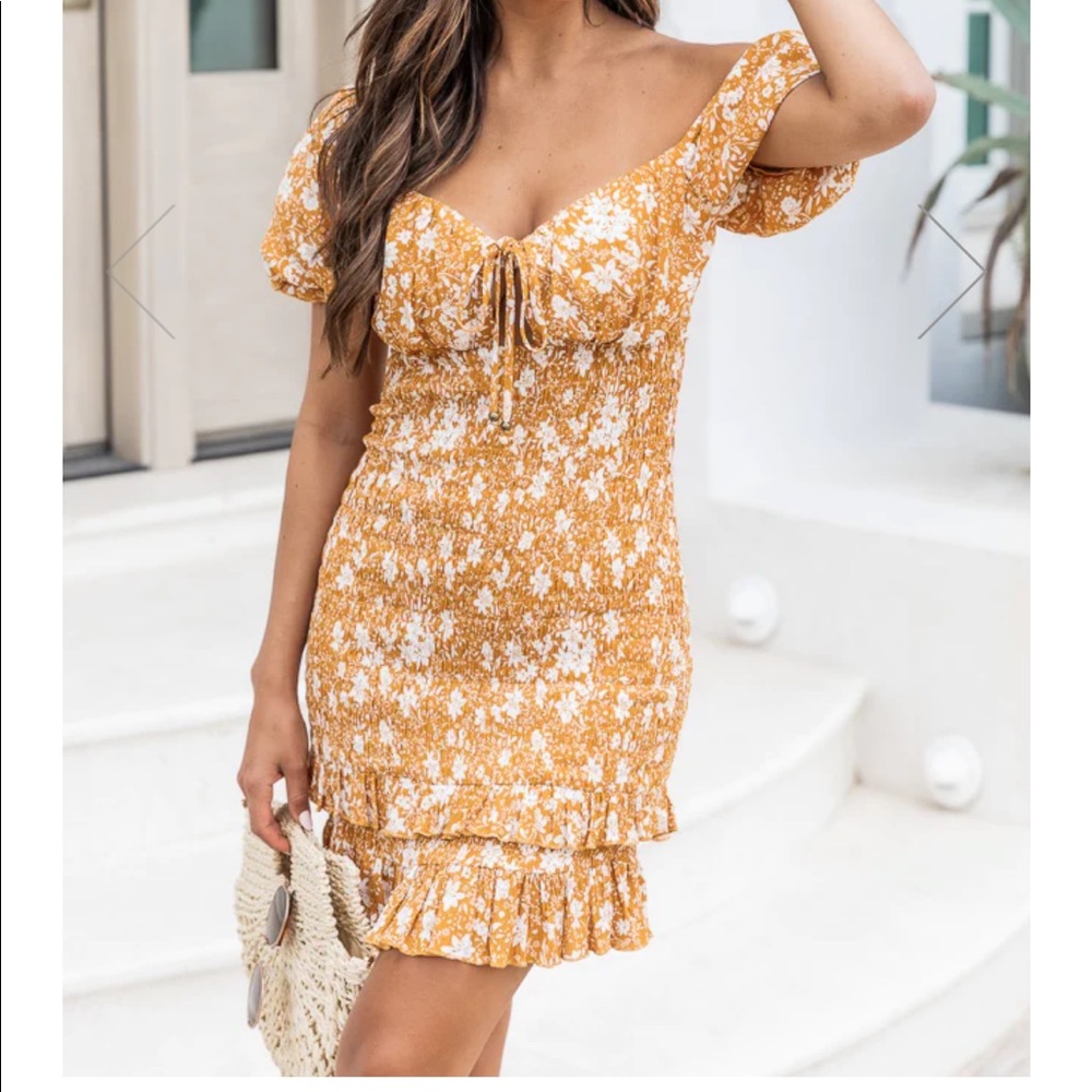 Mustard yellow floral mini dress. Size small from Pink Lilly Boutique